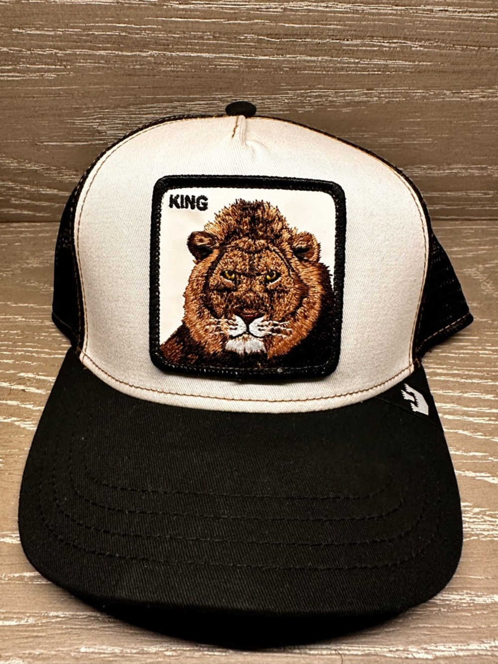 Goorin Bros King Lion Patch Trucker Hat in Black and White